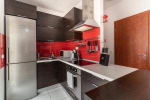 Kuchyň nebo kuchyňský kout v ubytování Grand 56 Apartman-Keszthely + 11 fotografií