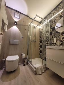 Koupelna v ubytování Ambiente Hotel garni + 37 fotografií