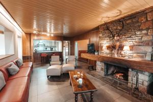 Гостиная зона в Le Loup Gris - 35 pers - Vue-Wellness, Butgenbach-Malmedy