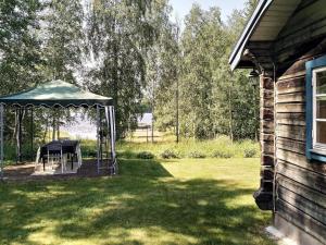 a gazebo in the yard of a house at 6 person holiday home in GRANG RDE in Grangärde
