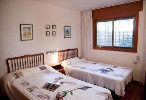Tempat tidur dalam kamar di Villa Monbijou