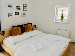 Postel nebo postele na pokoji v ubytování Apartman u Štoly