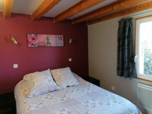 Ein Bett oder Betten in einem Zimmer der Unterkunft Gîte La Bodib