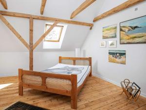 Postel nebo postele na pokoji v ubytování 6 person holiday home in Hjørring
