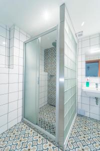 Koupelna v ubytování Pension Les + 37 fotografií