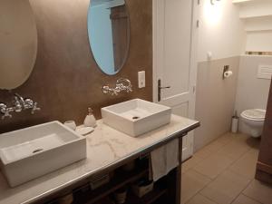 Een badkamer bij Au Coeur du Luberon