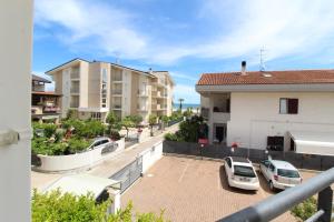 a view from the balcony of a apartment building at Solemare in Tortoreto Lido