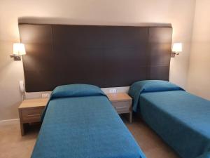 A bed or beds in a room at Il Gabbiano
