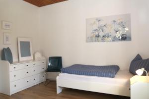 Postel nebo postele na pokoji v ubytování Wrede