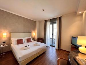 Posteľ alebo postele v izbe v ubytovaní Best Western Hotel City