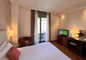 Posteľ alebo postele v izbe v ubytovaní Best Western Hotel City