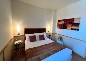 Posteľ alebo postele v izbe v ubytovaní Best Western Hotel City