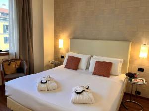 Posteľ alebo postele v izbe v ubytovaní Best Western Hotel City