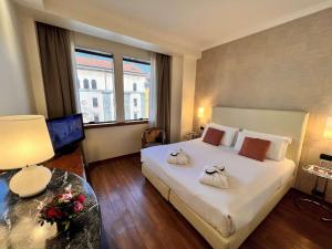 Posteľ alebo postele v izbe v ubytovaní Best Western Hotel City