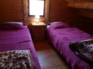 מיטה או מיטות בחדר ב-Family Summer House in Jurmala