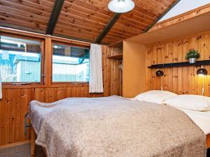 Postel nebo postele na pokoji v ubytování Holiday home Knebel XLIV