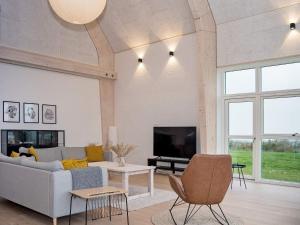 TV a/nebo společenská místnost v ubytování Holiday home Løgstør XVIII