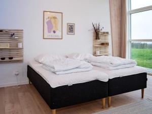 Postel nebo postele na pokoji v ubytování Holiday home Løgstør XVIII