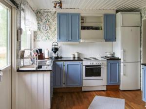 Kuchyň nebo kuchyňský kout v ubytování 4 person holiday home in VITTSJ