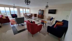 A television and/or entertainment centre at Alex sea view apartment - families only