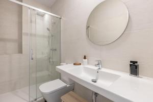 Kúpeľňa v ubytovaní Apartamentos Líbere Granada Catedral