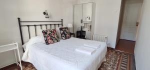 Posteľ alebo postele v izbe v ubytovaní Casa Consell Bailen, Guest House