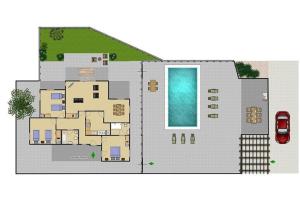 a floor plan of a villa with a swimming pool at Villa Brigida in Patroves