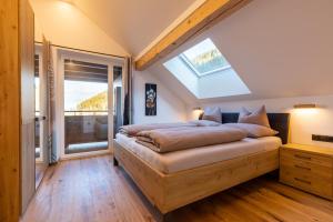 A bed or beds in a room at Appartments zum Beck