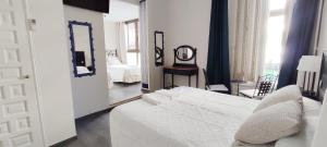 Posteľ alebo postele v izbe v ubytovaní Casa Consell Bailen, Guest House