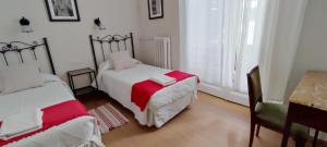 Posteľ alebo postele v izbe v ubytovaní Casa Consell Bailen, Guest House