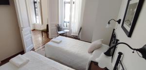 Posteľ alebo postele v izbe v ubytovaní Casa Consell Bailen, Guest House