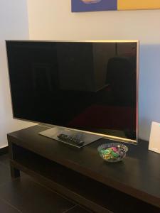 A television and/or entertainment centre at L’ARTSHOP