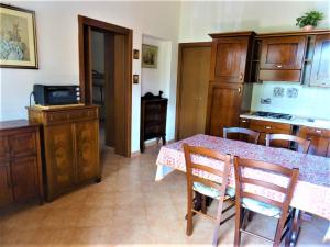 A kitchen or kitchenette at Vecchio Faro Residence
