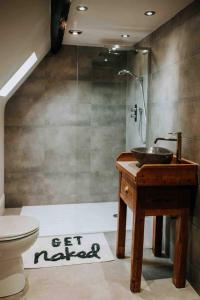 a bathroom with a sink and a toilet at Apartment22. A stylish and spacious Apartment in the heart of Historic Market town of Beverley. in Beverley