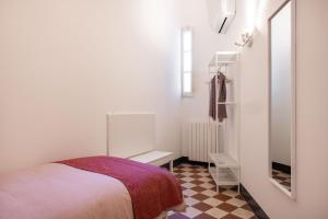 Posteľ alebo postele v izbe v ubytovaní Casa Rorro' nei pressi di Via Roma by Wonderful Italy