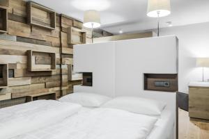 Voodi või voodid majutusasutuse Hotel Col Alto toas