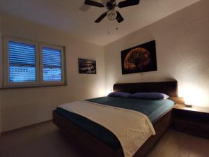 Posteľ alebo postele v izbe v ubytovaní Apartment Mira - Sea view