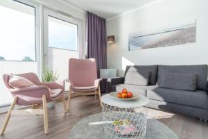 Ein Sitzbereich in der Unterkunft Apartmenthaus "Kiki", Wohnung "Traumbude"