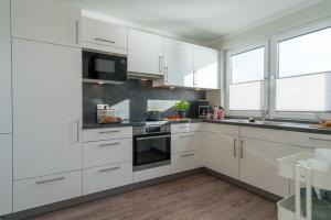 Küche/Küchenzeile in der Unterkunft Apartmenthaus "Kiki", Wohnung "Traumbude"