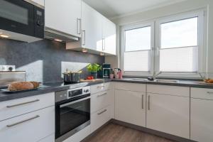 Küche/Küchenzeile in der Unterkunft Apartmenthaus "Kiki", Wohnung "Traumbude"