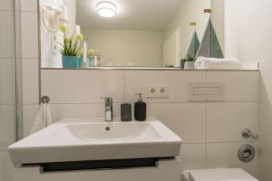 Ein Badezimmer in der Unterkunft Apartmenthaus "Kiki", Wohnung "Traumbude"