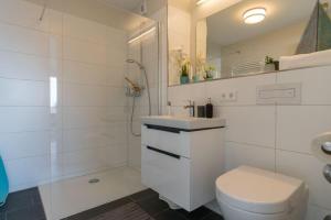 Ein Badezimmer in der Unterkunft Apartmenthaus "Kiki", Wohnung "Traumbude"