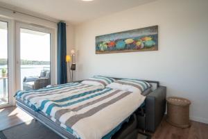 Postel nebo postele na pokoji v ubytování Apartmenthaus-Kiki-Wohnung-Kiek-in