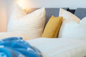 Postel nebo postele na pokoji v ubytování Apartmenthaus-Kiki-Wohnung-Kiek-in