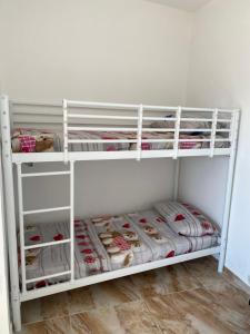 Postel nebo postele na pokoji v ubytování L'oasi del Tuffatore