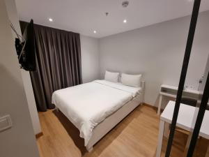 Postel nebo postele na pokoji v ubytování 10m2 Hotel