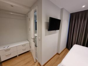 Postel nebo postele na pokoji v ubytování 10m2 Hotel + 4 fotografie