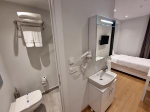 Koupelna v ubytování 10m2 Hotel