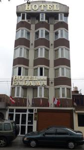 a hotel with a car parked in front of it at Padama in Lima