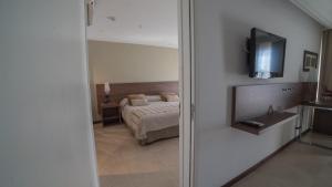 Postel nebo postele na pokoji v ubytování Hotel Estilo MB - Villa Carlos Paz